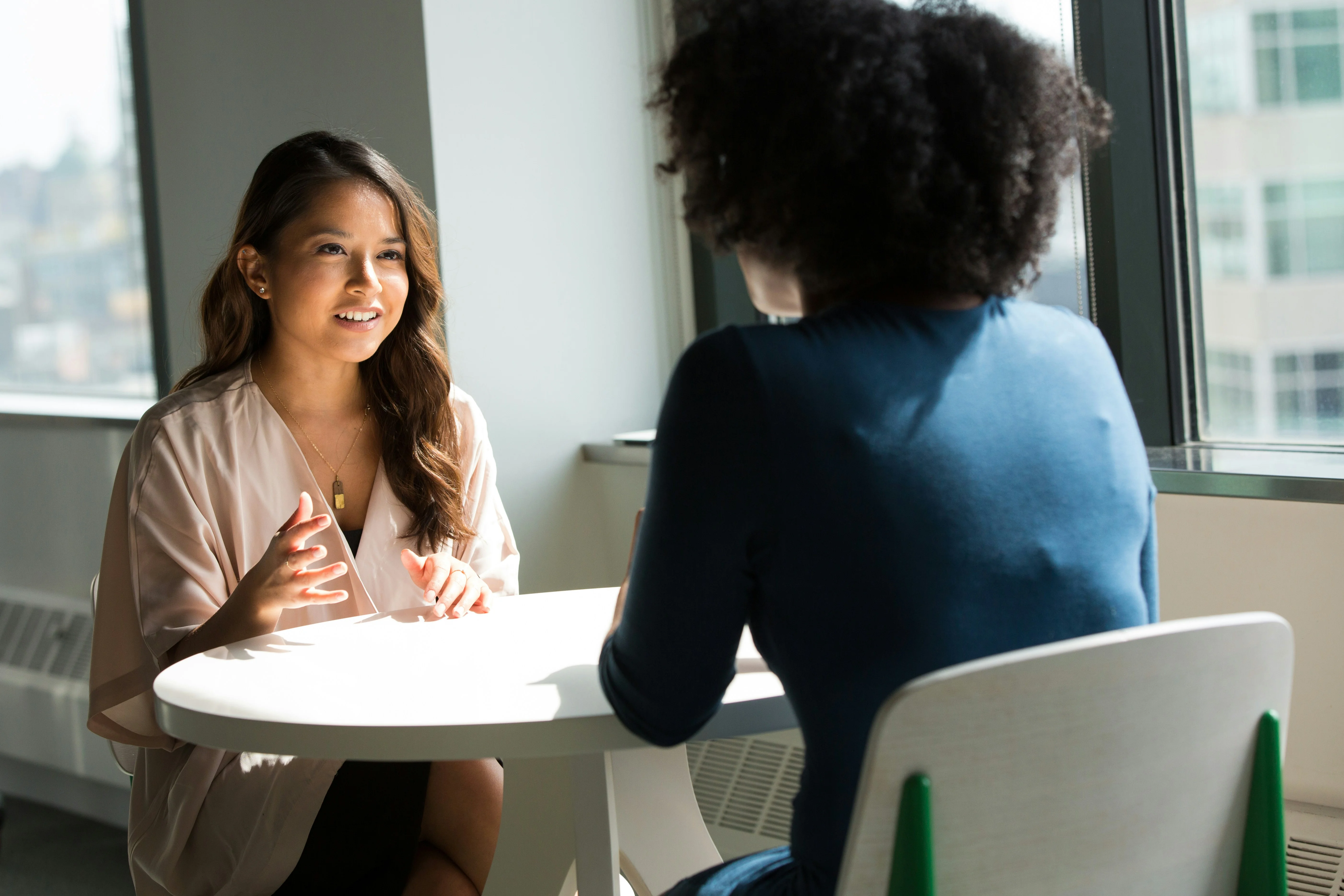 Confident professional preparing and documenting their case for a salary negotiation